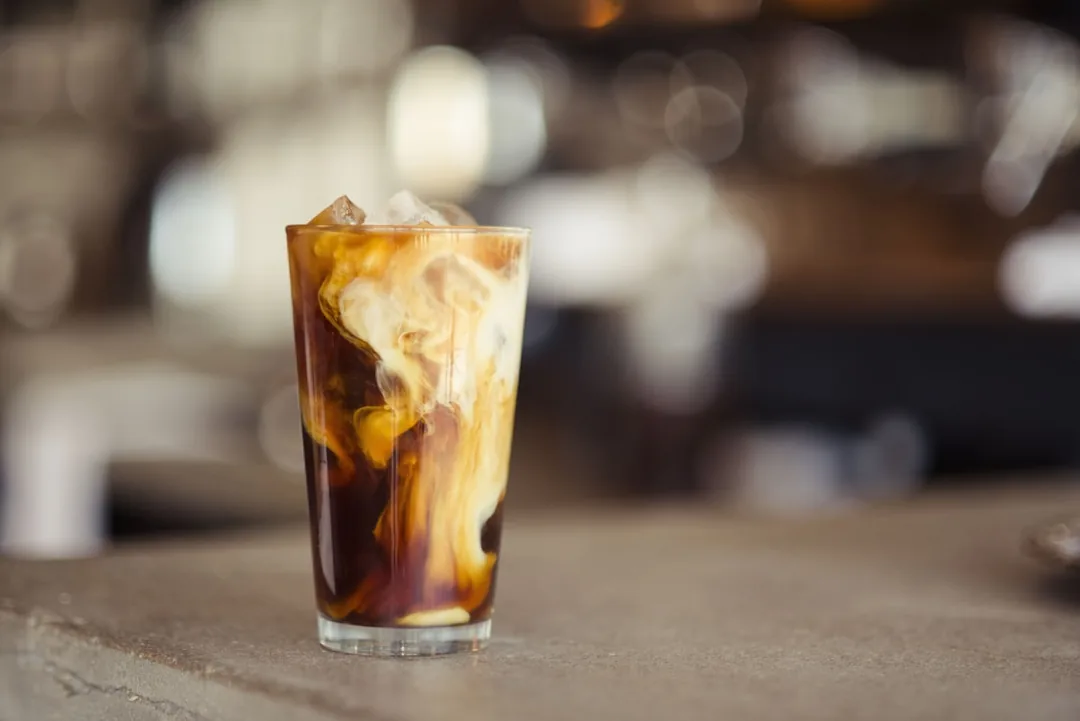 Cốt dừa cà phê — món signature 65.000đ, ăn bằng thìa