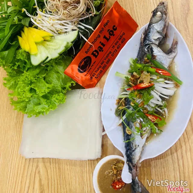ม้วนปลาหมึกผักบุ้ง