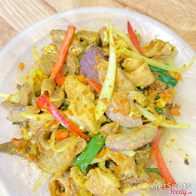 เครื่องในผัดขมิ้น (เล็ก) + ข้าวเกรียบ (ไม่มีเส้น)
