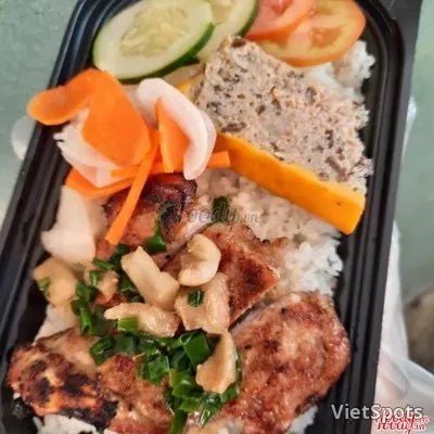 Broken rice with pork chop & egg meatloaf + Pepsi can